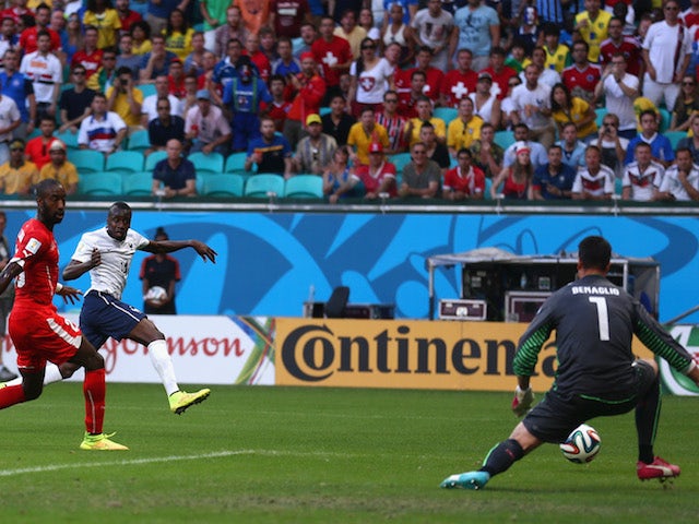 Blaise Matuidi of France shoots and scores France's second goal past goalkeeper Diego Benaglio of Switzerland on June 20, 2014