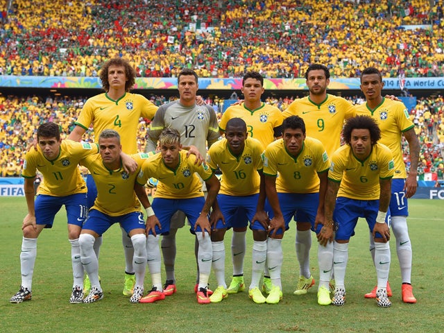 Brazil players pose for a team photo before the 2014 FIFA World Cup Brazil Group A match between Brazil and Mexico at Castelao on June 17, 2014