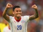 Charles Aranguiz of Chile celebrates scoring his team's second goal during the 2014 FIFA World Cup Brazil Group B match between Spain and Chile at Maracana on June 18, 2014