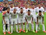 Chile's national team pose for a team photo prior to a Group B football match between Spain and Chile in the Maracana Stadium in Rio de Janeiro during the 2014 FIFA World Cup on June 18, 2014