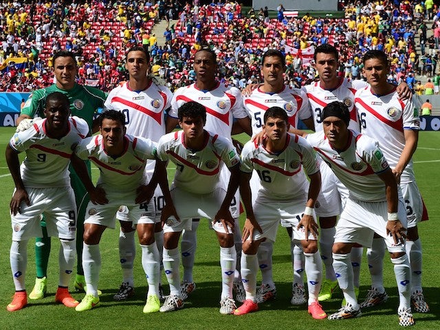 Costa Rica's national team players pose for team picture prior to a Group D football match between Italy and Costa Rica at the Pernambuco Arena in Recife during the 2014 FIFA World Cup on June 20, 2014