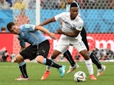 Uruguay's midfielder Cristian Rodriguez (L) vies with England's midfielder Raheem Sterling (R) during a Group D football match on June 19, 2014