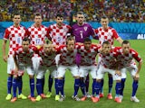 Croatia pose for a team photo prior to the 2014 FIFA World Cup Brazil Group A match between Cameroon and Croatia at Arena Amazonia on June 18, 2014 