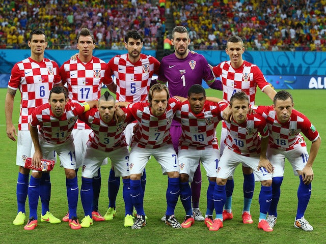 Croatia pose for a team photo prior to the 2014 FIFA World Cup Brazil Group A match between Cameroon and Croatia at Arena Amazonia on June 18, 2014 