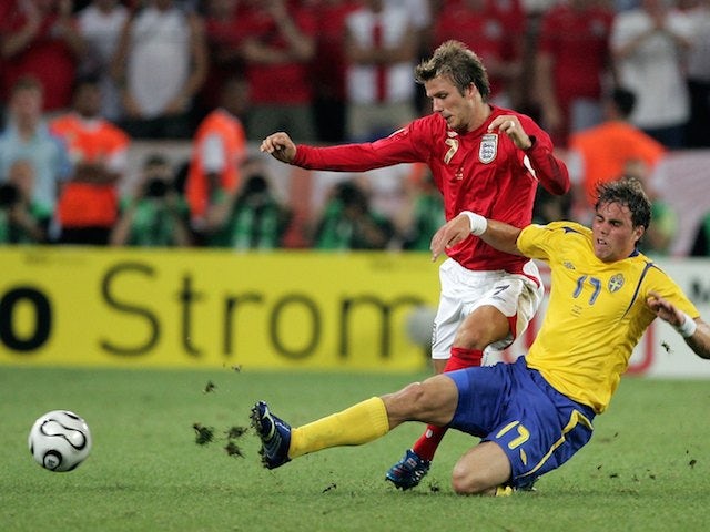 David Beckham of England is tackled by Johan Elmander of Sweden during the FIFA World Cup Germany 2006 Group B match between Sweden and England  on June 20, 2006