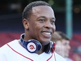 Producer and musician Dr. Dre is on the field before the Boston Red Sox take on the the New York Yankees on April 4, 2010 
