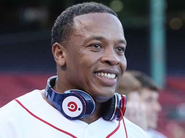 Producer and musician Dr. Dre is on the field before the Boston Red Sox take on the the New York Yankees on April 4, 2010 
