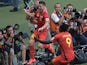 Belgium's midfielder Dries Mertens (L) celebrates after scoring his team's second goal during the Group H football match against Algeria on June 17, 2014