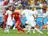 Eden Hazard of Belgium controls the ball against Madjid Bougherra of Algeria during the 2014 FIFA World Cup Brazil Group H match on June 17, 2014