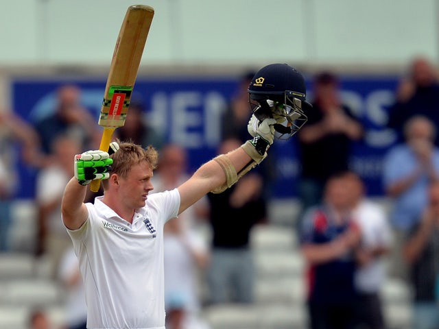 England's Sam Robson celebrates scoring his maidan century on the second day of the second Test match between England and Sri Lanka at Headingley cricket ground in Leeds, northern England on June 21, 2014