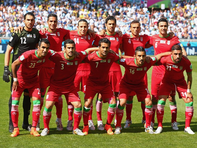 : Iran players pose for a team photo before the 2014 FIFA World Cup Brazil Group F match between Argentina and Iran at Estadio Mineirao on June 21, 2014