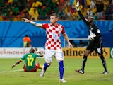 Ivica Olic celebrates scoring Croatia's first goal against Cameroon on June 18, 2014.