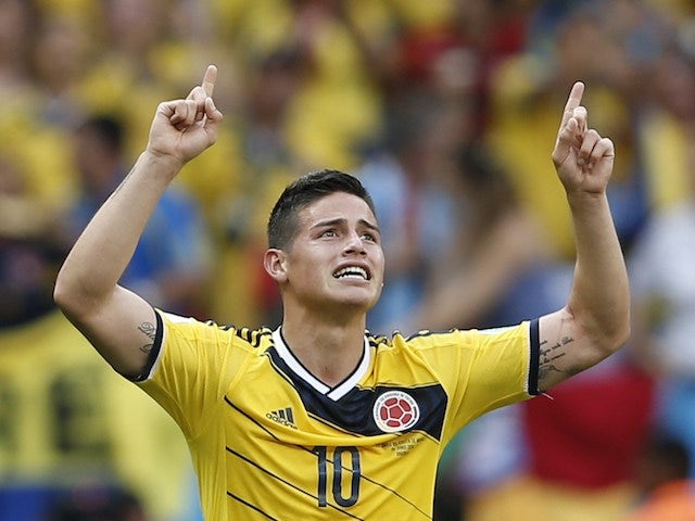 Colombia's midfielder James Rodriguez celebrates scoring during a Group C football match between Colombia and Ivory Coast on June 19, 2014