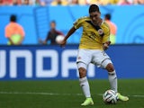 Colombia's midfielder Juan Fernando Quintero prepares to kick the ball to score his team's second goal during the Group C football match on June 19, 2014