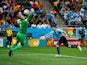 Luis Suarez of Uruguay scores his team's first goal past Joe Hart of England during the 2014 FIFA World Cup Brazil Group D match on June 19, 2014