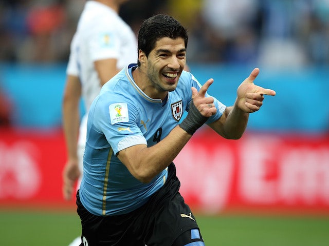 Luis Suarez of Uruguay celebrates scoring his team's first goal during the 2014 FIFA World Cup Brazil Group D match against England on June 19, 2014