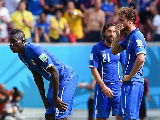 Mario Balotelli, Andrea Pirlo and Claudio Marchisio of Italy look on during the 2014 FIFA World Cup Brazil Group D match against Costa Rica on June 20, 2014