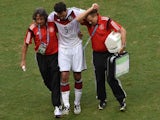 Mats Hummels is taken off injured during Germany's 4-0 victory over Portugal on June 16, 2014.