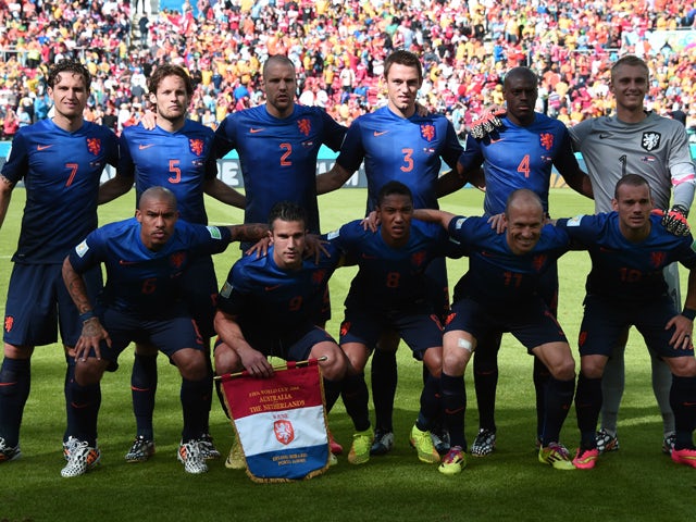 Members of the Netherlands national team pose prior to a Group B football match between Australia and the Netherlands at the Beira-Rio Stadium in Porto Alegre during the 2014 FIFA World Cup on June 18, 2014