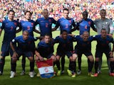 Members of the Netherlands national team pose prior to a Group B football match between Australia and the Netherlands at the Beira-Rio Stadium in Porto Alegre during the 2014 FIFA World Cup on June 18, 2014