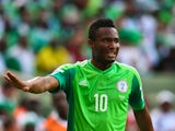 John Obi Mikel of Nigeria gestures during the 2014 FIFA World Cup Brazil Group F match between Iran and Nigeria at Arena da Baixada on June 16, 2014