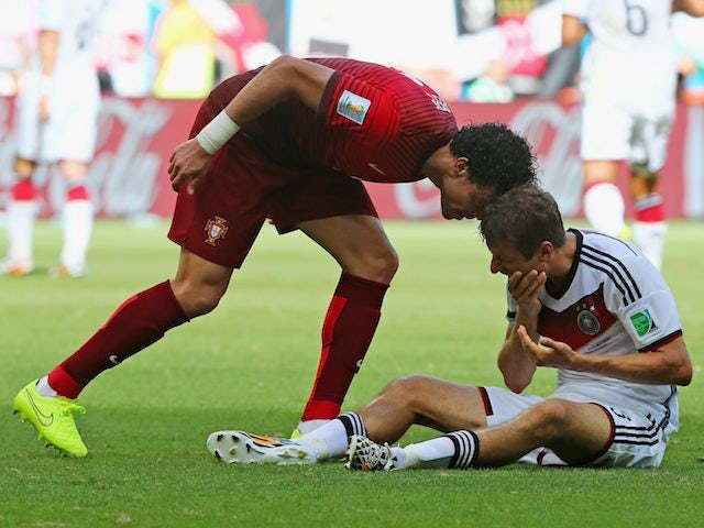 Portugal's Pepe headbutts Thomas Mueller of Germany during their World Cup encounter on June 16, 2014.