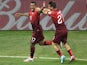 Portugal's forward Nani celebrates with Portugal's defender Joao Pereira after scoring during a Group G football match between USA and Portugal at the Amazonia Arena in Manaus during the 2014 FIFA World Cup on June 22, 2014