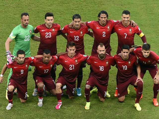 Portugal players pose before a Group G football match between USA and Portugal at the Amazonia Arena in Manaus during the 2014 FIFA World Cup on June 22, 2014
