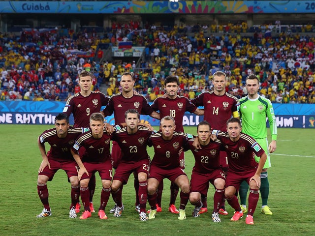 Russia pose for a team photo prior to the 2014 FIFA World Cup Brazil Group H match between Russia and South Korea at Arena Pantanal on June 17, 2014