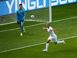 Sofiane Feghouli of Algeria celebrates scoring a penalty during the World Cup Group H match against Belgium in Belo Horizonte on June 17, 2014