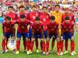 South Korea post for a team photo prior to the 2014 FIFA World Cup Brazil Group H match between South Korea and Algeria at Estadio Beira-Rio on June 22, 2014 