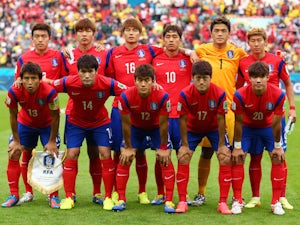 South Korea post for a team photo prior to the 2014 FIFA World Cup Brazil Group H match between South Korea and Algeria at Estadio Beira-Rio on June 22, 2014 