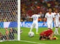 Sergio Busquets of Spain reacts after a missed chance as goalkeeper Claudio Bravo of Chile looks on during the 2014 FIFA World Cup Brazil Group B match between Spain and Chile at Maracana on June 18, 2014