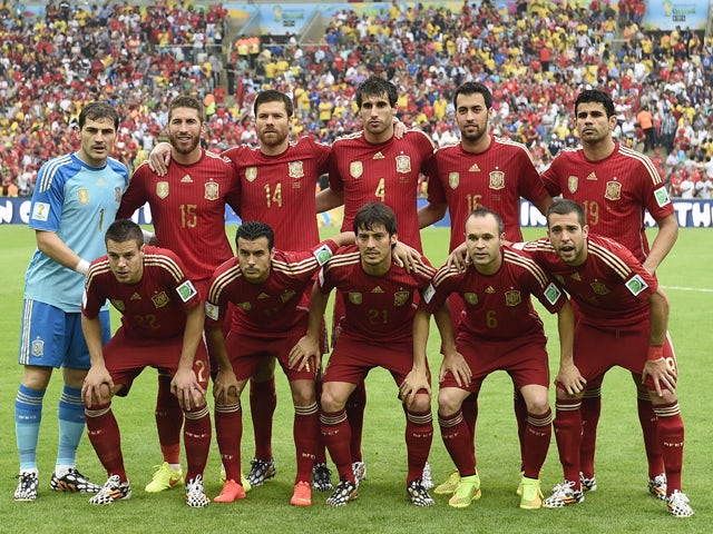 Members of Spain's national team pose for the team photo prior to the Group B football match between Spain and Chile in the Maracana Stadium in Rio de Janeiro during the 2014 FIFA World Cup on June 18, 2014