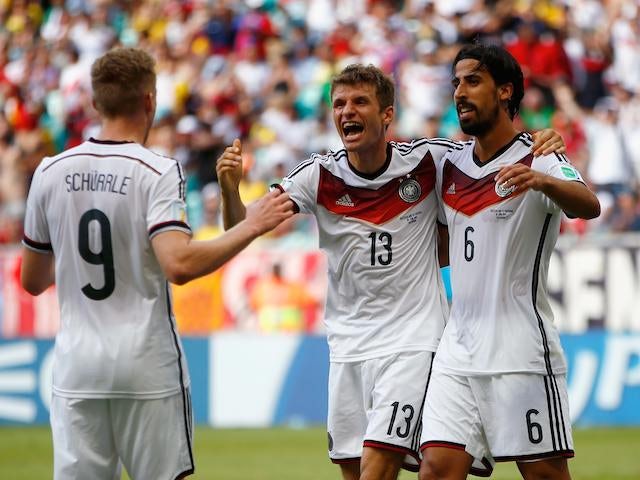 Thomas Mueller celebrates scoring his hattrick for Germany in their World Cup opening game against Portugal on June 16, 2014.