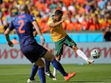 Australia forward Tim Cahill volleys home the equaliser against the Netherlands during their World Cup Group B game in Porto Alegre on June 18, 2014