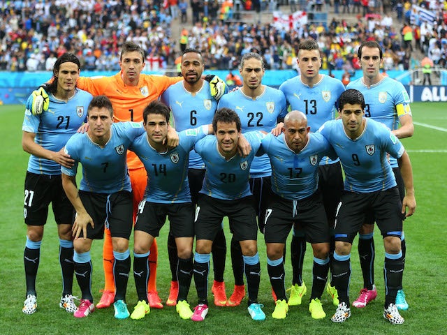 Uruguay pose for a team photo prior to the 2014 FIFA World Cup Brazil Group D match between Uruguay and England at Arena de Sao Paulo on June 19, 2014