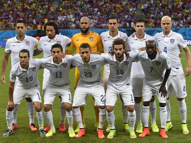 USA players pose before a Group G football match between USA and Portugal at the Amazonia Arena in Manaus during the 2014 FIFA World Cup on June 22, 2014