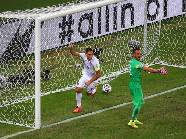 Clint Dempsey of the United States celebrates scoring his team's second goal past Beto of Portugal during the 2014 FIFA World Cup Brazil Group G match between the United States and Portugal at Arena Amazonia on June 22, 2014