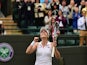 France's Alize Cornet celebrates after winning her women's singles third round match against US player Serena Williams on day six of the 2014 Wimbledon Championships at The All England Tennis Club in Wimbledon, southwest London, on June 28, 2014