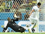 Greece's midfielder Andreas Samaris scores in the nets of Ivory Coast's goalkeeper Boubacar Barry during a Group C football match on June 24, 2014