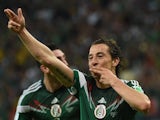 Mexico's defender Andres Guardado celebrates after scoring the 0-2 during a Group A football match against Croatia on June 23, 2014