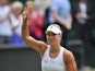 Germany's Angelique Kerber celebrates beating Britain's Heather Watson during their women's singles second round match on day four of the 2014 Wimbledon Championships at The All England Tennis Club in Wimbledon, southwest London, on June 26, 2014