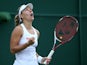 Germany's Angelique Kerber celebrates after winning her women's singles third round match against Belgium's Kirsten Flipkins on day six of the 2014 Wimbledon Championships at The All England Tennis Club in Wimbledon, southwest London, on June 28, 2014