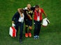 Anthony Vanden Borre of Belgium is helped off the pitch during the 2014 FIFA World Cup Brazil Group H match against South Korea on June 28, 2014