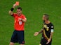 Belgium's midfielder Steven Defour is shown a red card by Australian referee Benjamin Jon Williams during a Group H football match between South Korea and Belgium at the Corinthians Arena in Sao Paulo during the 2014 FIFA World Cup on June 26, 2014