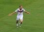 Benedikt Howedes of Germany celebrates after his team's second goal during the 2014 FIFA World Cup Brazil Group G match between Germany and Ghana at Castelao on June 21, 2014