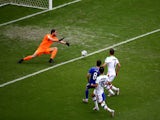 Miralem Pjanic of Bosnia and Herzegovina shoots and scores his team's second goal past goalkeeper Alireza Haghighi of Iran during the 2014 FIFA World Cup Brazil Group F match between Bosnia and Herzegovina and Iran at Arena Fonte Nova on June 25, 2014
