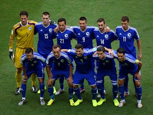 Bosnia and Herzegovina players pose for a team photo prior to the 2014 FIFA World Cup Brazil Group F match between Bosnia and Herzegovina and Iran at Arena Fonte Nova on June 25, 2014