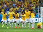 Brazil players celebrate their penalty shootout victory over Chile in the World Cup round of 16 in Belo Horizonte on June 28, 2014